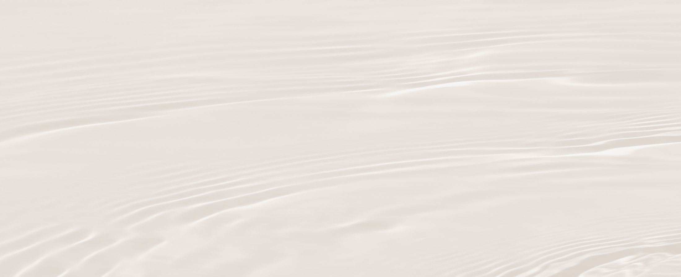 Calm water surface with gentle ripples.