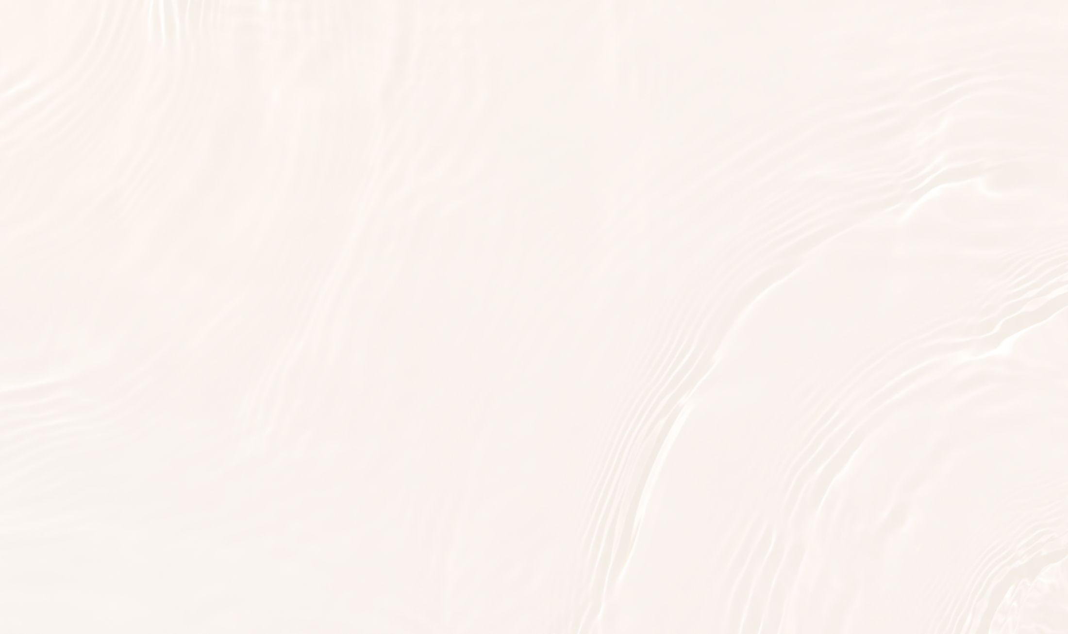 Gentle ripples on smooth white surface.