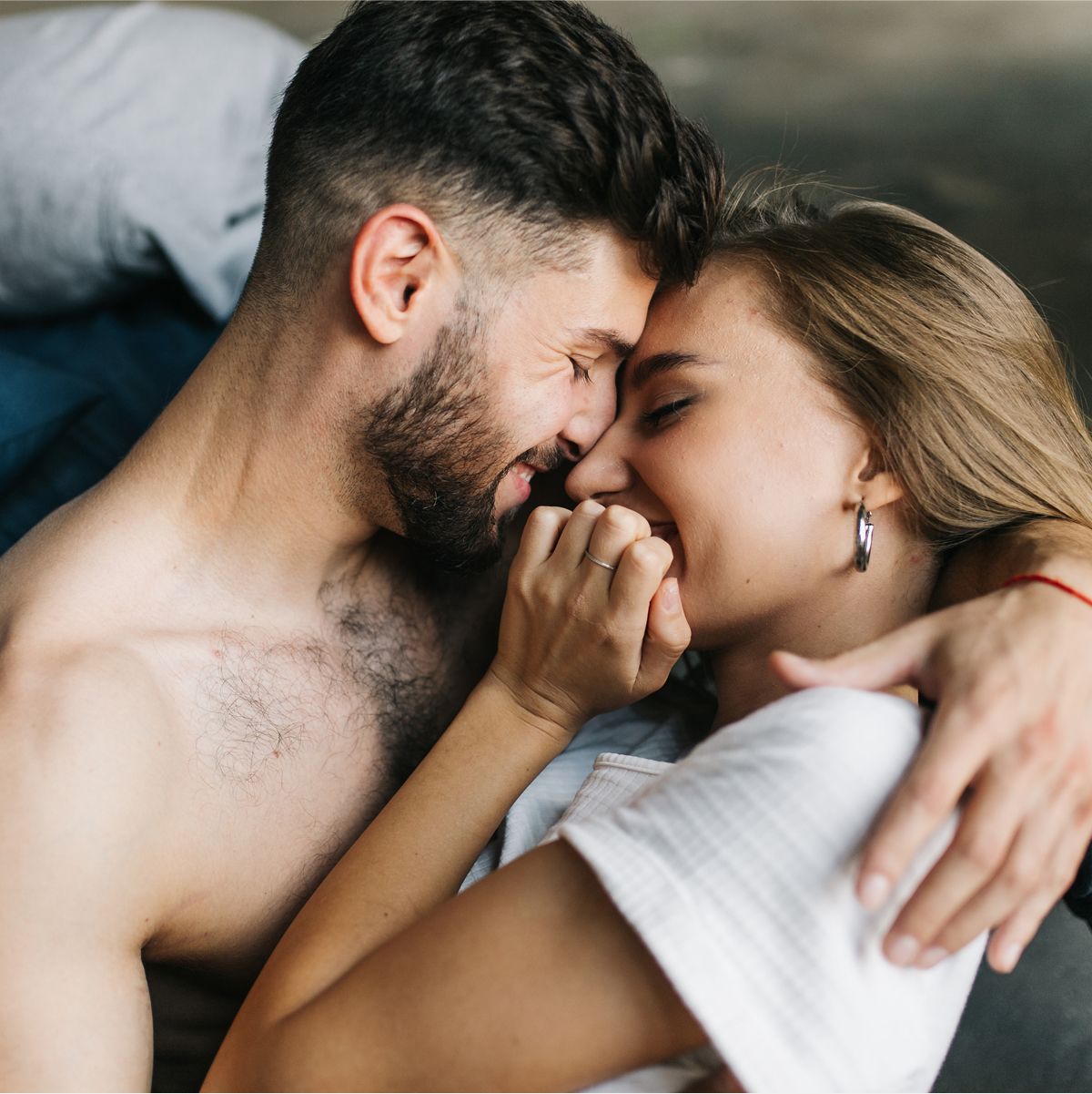 hormone replacement therapy patient models embracing and sharing a playful moment.
